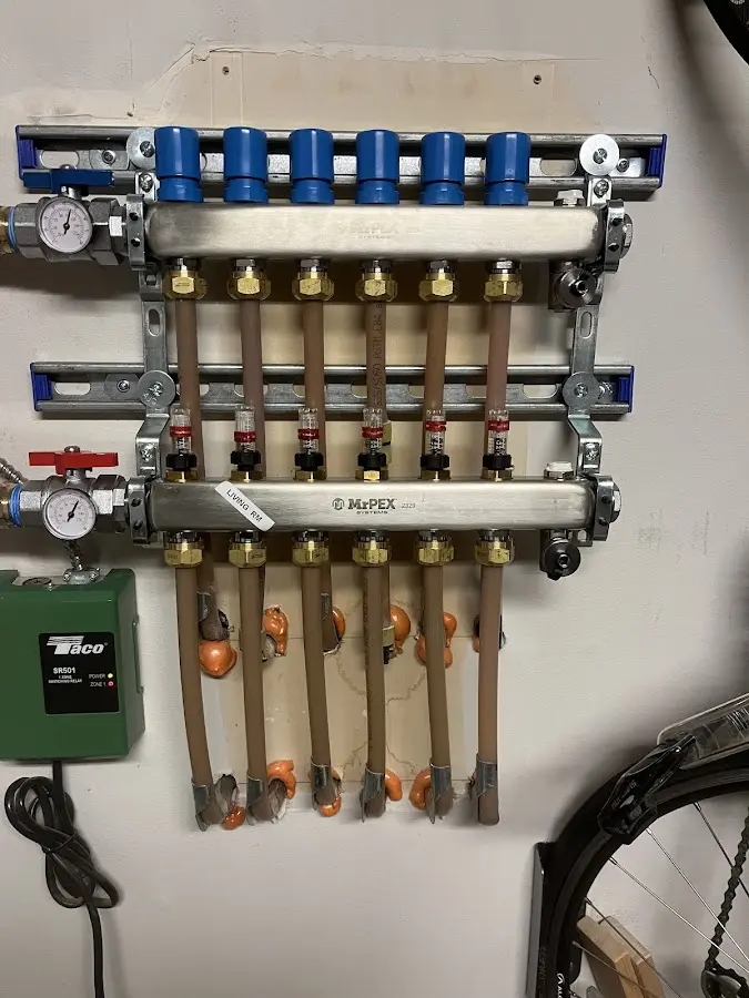 Plumber performing Water Heater Repair at a residential property in East Alton